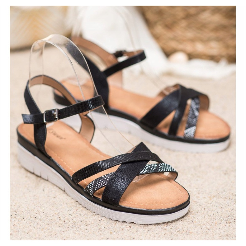 Small Swan Sandaalit matalalla kiilalla musta 1