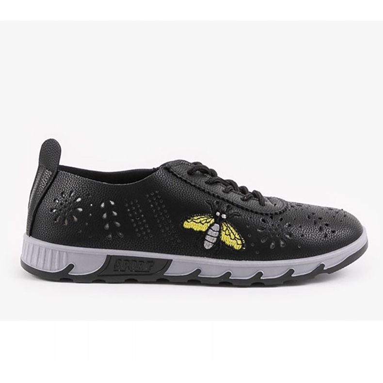 Mustat harjatut lenkkarit, joissa painatus JH81171-3 1