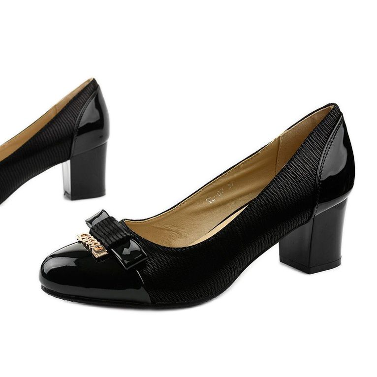 Naisten mustat pumput Greenbanen pylväässä 1