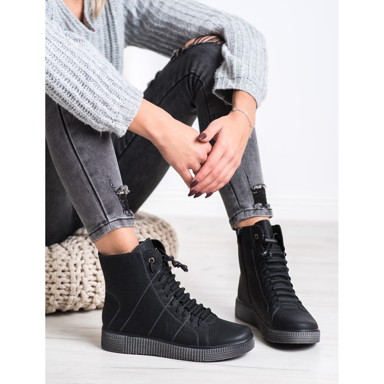 SHELOVET Mustia työntekijöitä Paltformilla musta 1