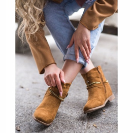 Cm Paris Ruskeat lehmityöt kiilalla keltainen 2