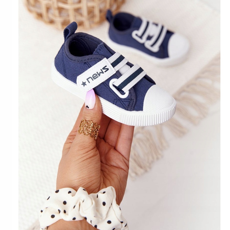 EVE Lasten lenkkarit tarranauhalla Navy Blue News tummansininen 1
