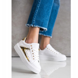 SHELOVET Valkoiset lenkkarit lavalla valkoinen musta keltainen 1