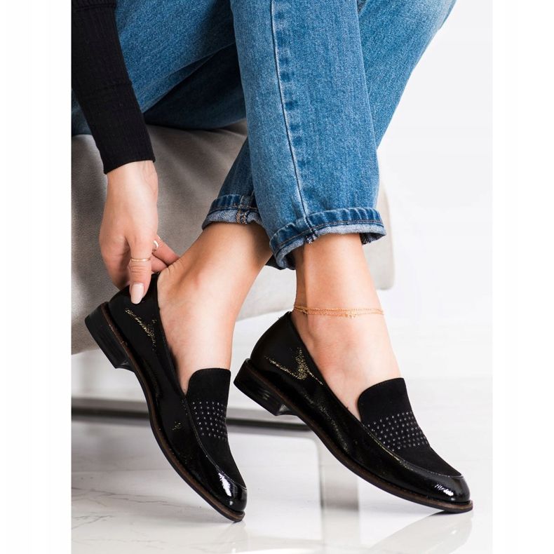 Tyylikkäät mustat kengät Sergio Leonelta 1