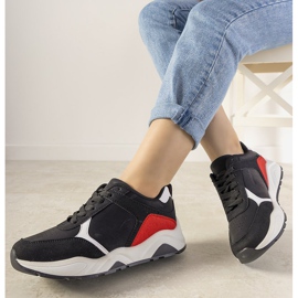 Mustat lenkkarit, joissa on punaiset harjoitusosat punainen 1