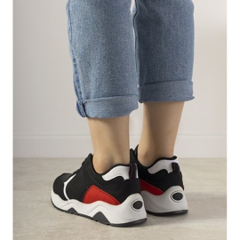 Mustat lenkkarit, joissa on punaiset harjoitusosat punainen 2