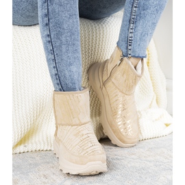 Naisten puolikuiset beige -lumisaappaat 1