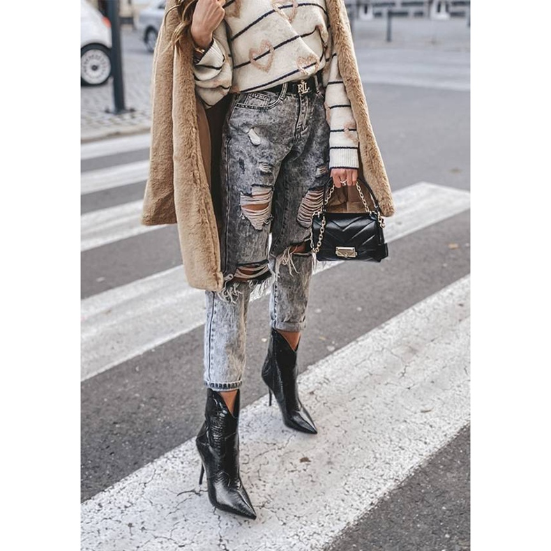 Mustat kohokuvioidut saappaat Cro-korkossa 2