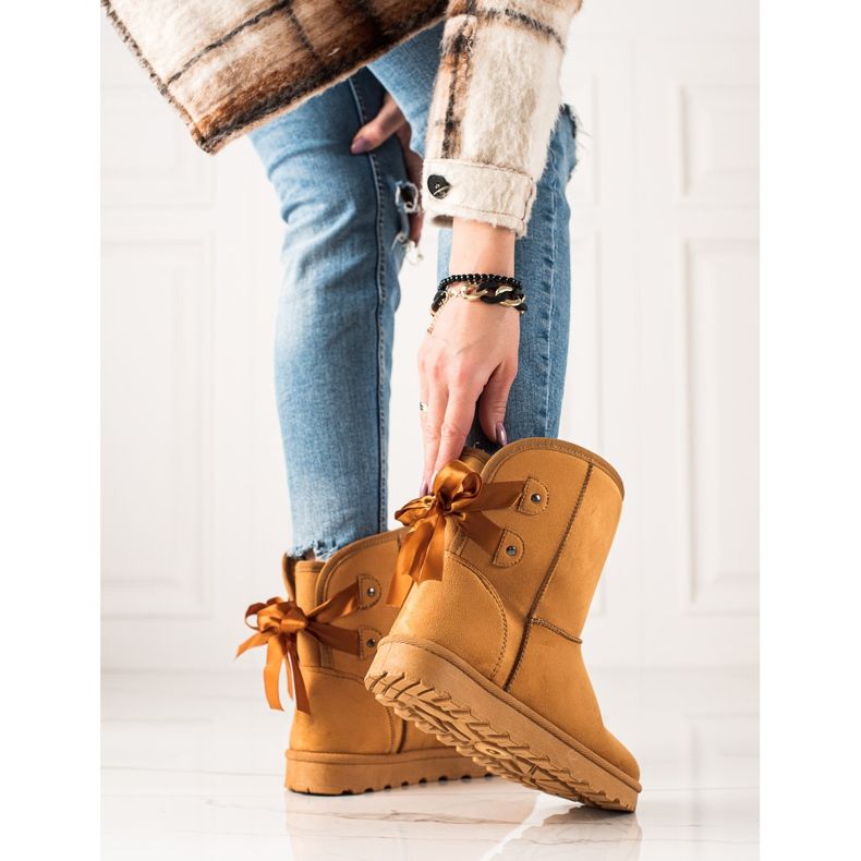 TRENDI Mukluki jousella keltainen 2