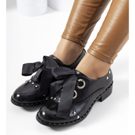 Mustat litteät kengät Belcastrolta 1