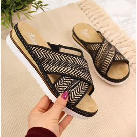 Mustat naisten tossut kiilakorolla Rieker 679A5 beige ruskea 1