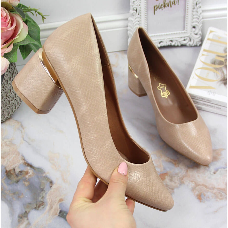 Pumput koristeellisessa beigessä Jezzi-tolppassa 1