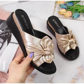 Naisten kultaiset kiilatossut Vinceza kultainen 1