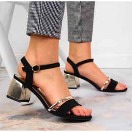 Sergio Leonen mustat ja kultaiset sandaalit pylväässä kultainen 2