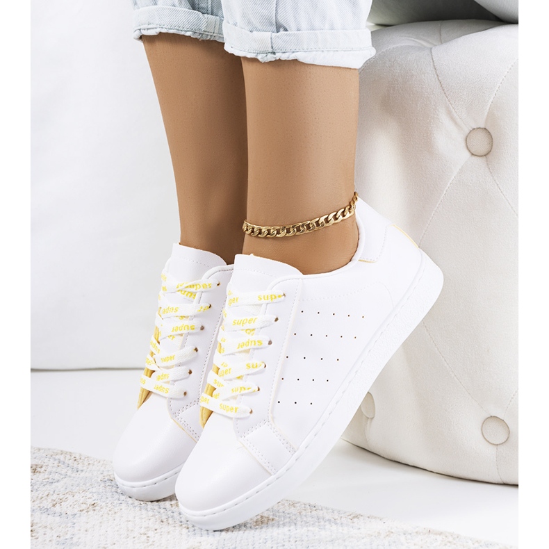 Kohon valkoiset ja keltaiset urheilukengät valkoinen 1