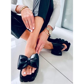 Keeshan mustat korkeapohjaiset tossut 1