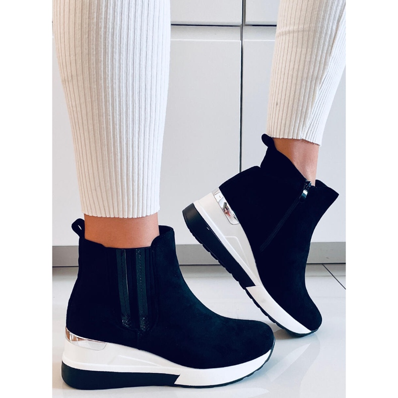 Varastossa mustat kiila saappaat 2