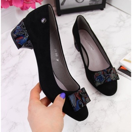 Mustat pumput Sergio Leonen koristeellisessa rusetissa 2