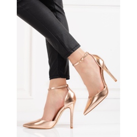 Naisten kultaiset Shelovet-korkokengät, jotka on kiinnitetty nilkan ympärille kultainen 1