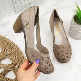 Naisten beigenväriset harjakattoiset nahkapumput Rieker 40986 2