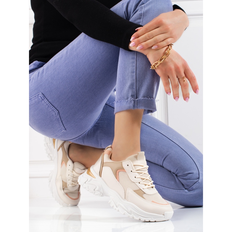 Naisten beigenväriset Shelovet platform tennarit oranssi 1