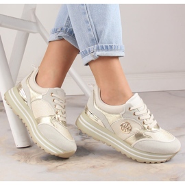 Naisten urheilukengät kultaisella alustalla Potocki SZ12025 kultainen 1