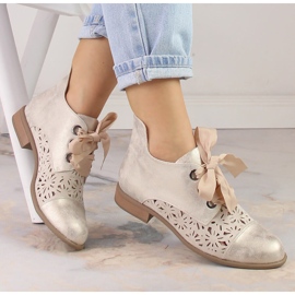 Naisten harjakattoiset kullanväriset tasakorkoiset saappaat Jezzi ASA142-6A kultainen 1