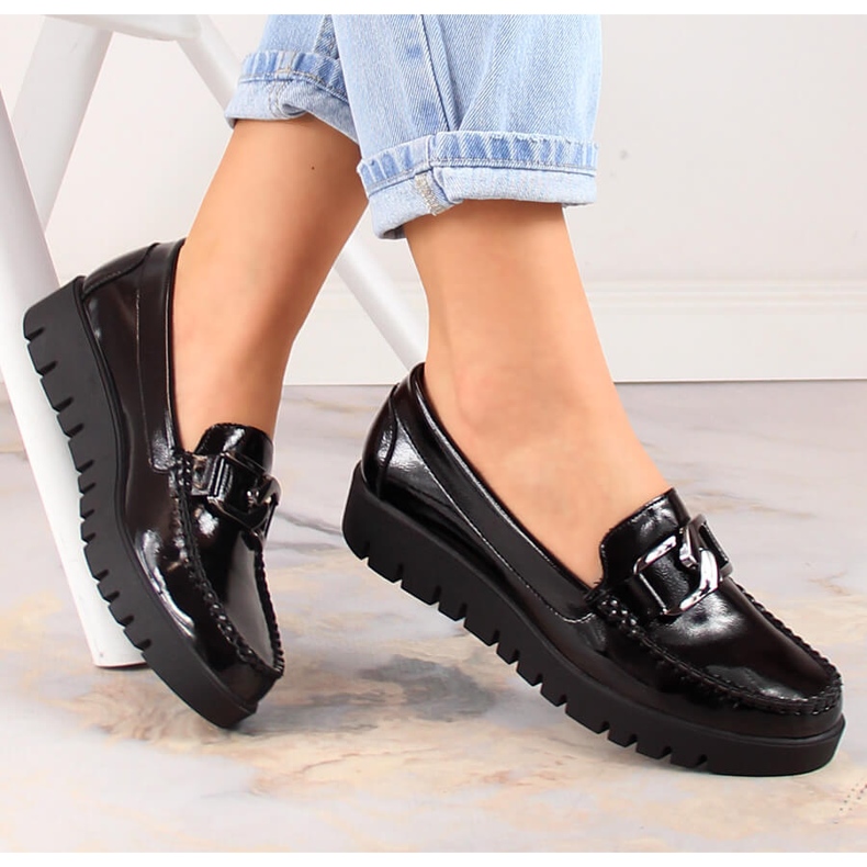 Lakatut naisten mokasiinit mustalla alustalla Sergio Leone MK757 1