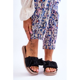 Naisten mokkanahkaiset tossut, joissa rusetti musta meripihka 1