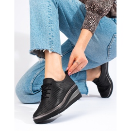 Mustat nahkaiset kiilakengät T.Sokolskilta 1