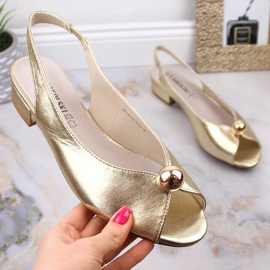 Naisten litteät metalliset kultasandaalit T.Sokolski L23-435 kultainen 1